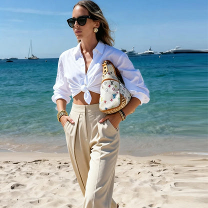 The Clapton Pleated Wide-Leg Trousers
